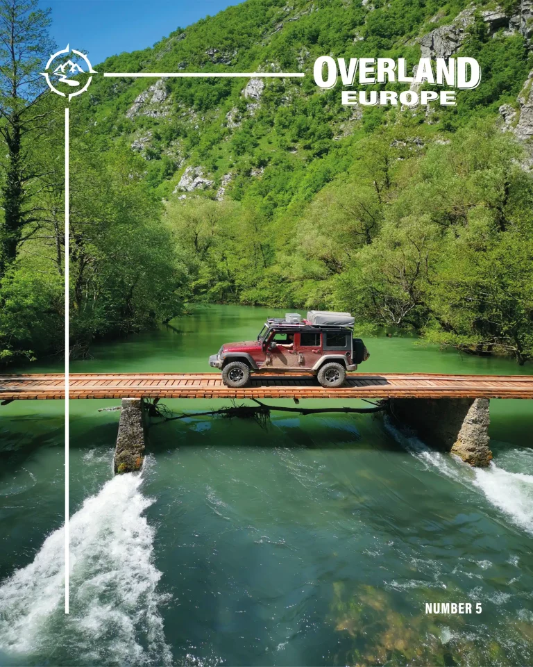 Number 5 front cover with Jeep crossing a wooden bridge over a river