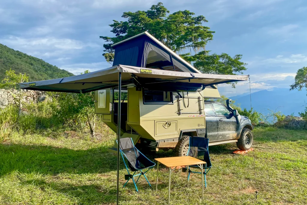 land roamer set up for camping in a remote area