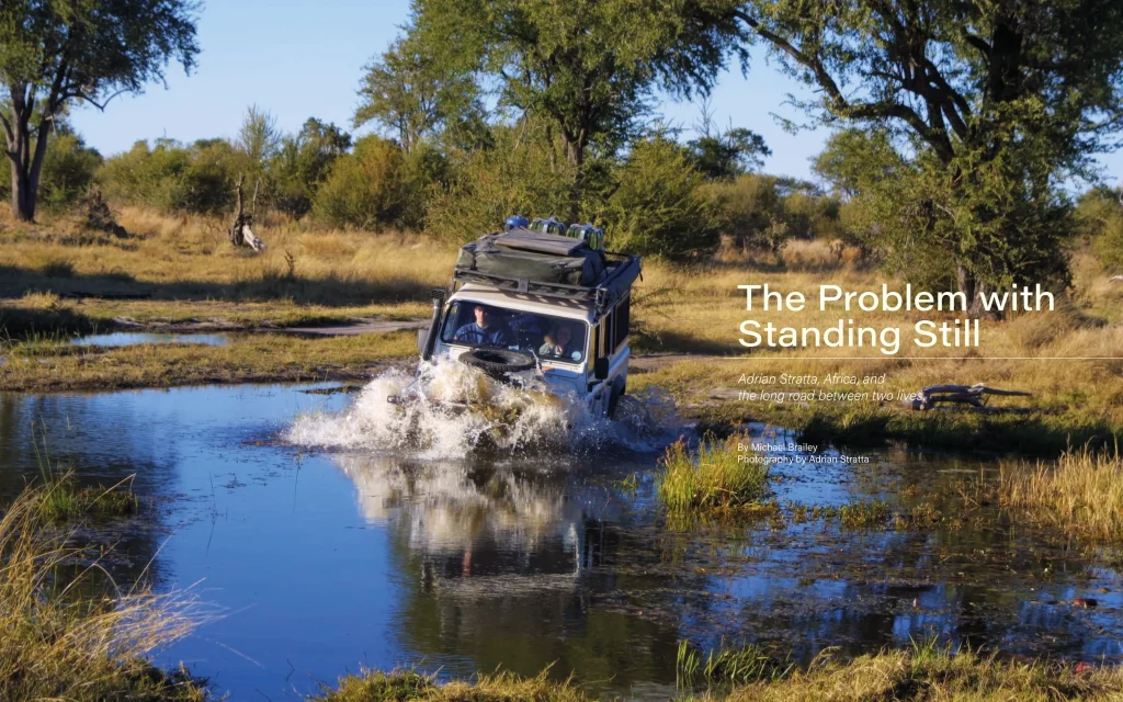 double page spread of magazine with land rover fording a river