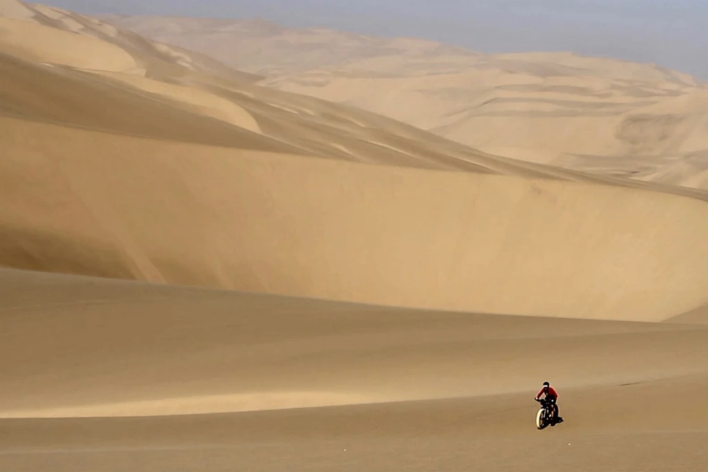 she had spent years learning to read sand; now she was learning to read snow. cycling across the vast desert